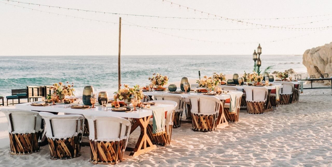 Table decorated with florals for a wedding reception.