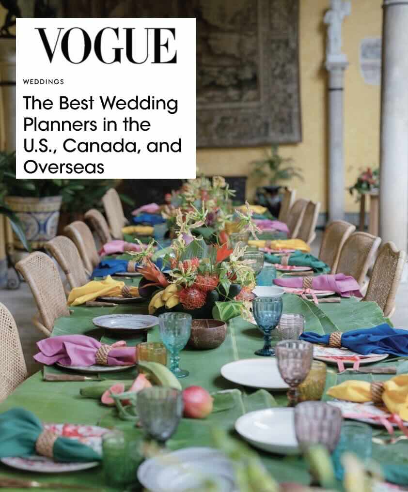 Dining table set with colorful napkins.