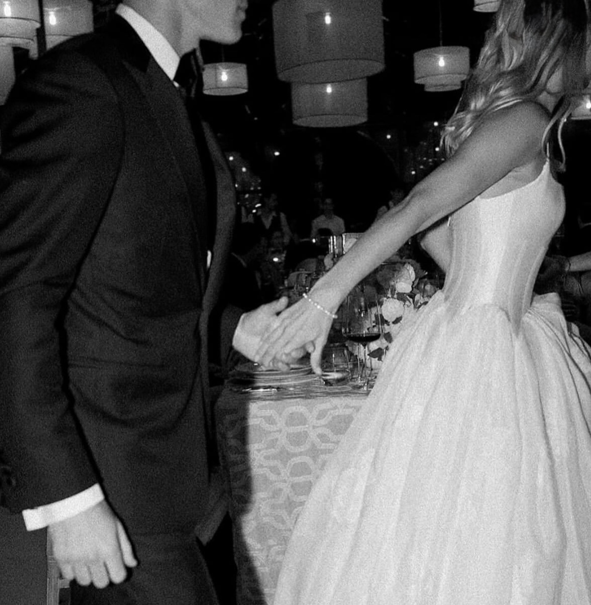 Black and white photp of a newlywed couple.